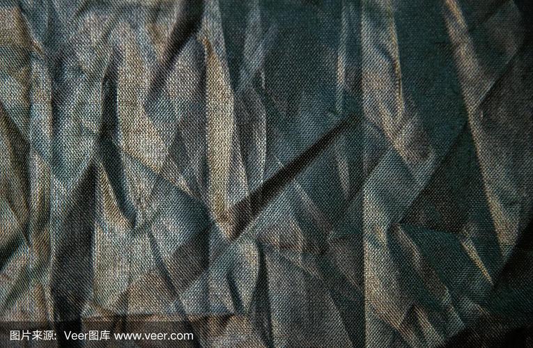 深蓝皱化纤织物的纹理